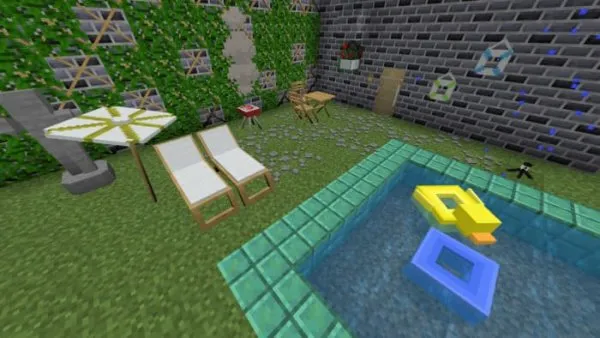 Pool and loungers in a beautiful garden.