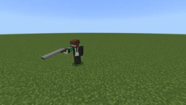 Double barrel shotgun in hand