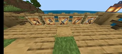 Five framed weapons displayed on a wooden fence