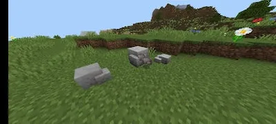 Stone structures on grassy terrain