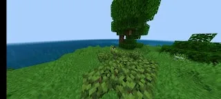 Dinosaur near trees by the ocean