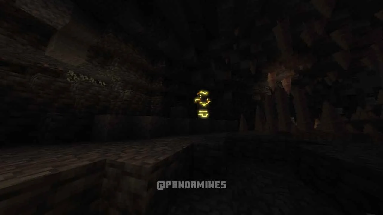 Glowing armor in a dark cave.