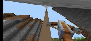 Player aims crossbow at tall stone pillar