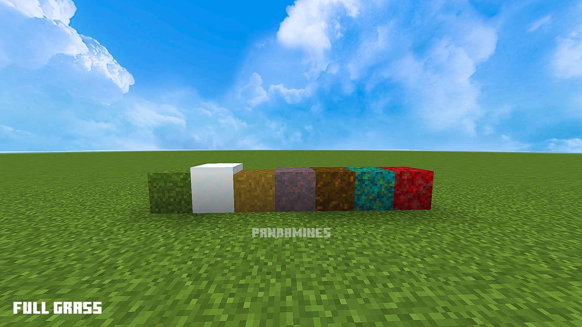 Colorful grass blocks on a grassy field.