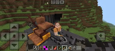 Player riding a dinosaur near a cave.