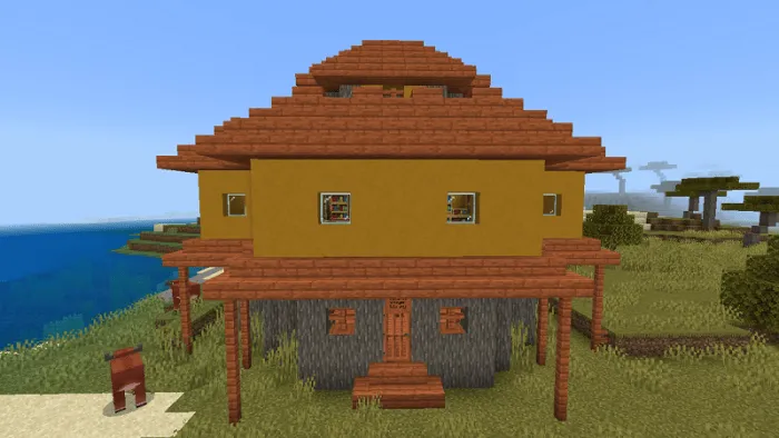 Enchanted yellow house near the shore.
