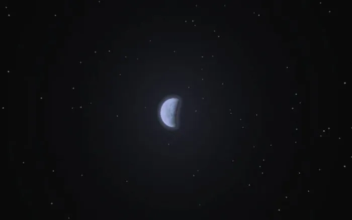 Half moon with stars in a dark sky.