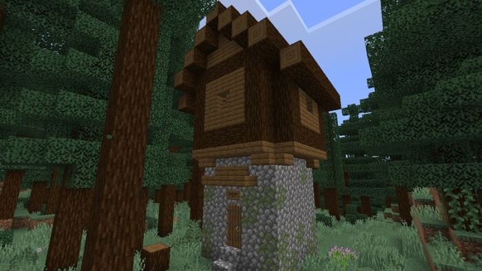 Enchanting forest structure with vines.
