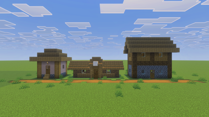 In-game screenshot showcasing a plains small house, a shepherd’s house and a big house along a dirt path.