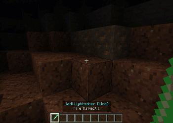 Green lightsaber in a dark cave.