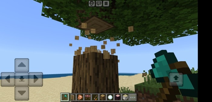 Axe chopping tree with blocks falling.