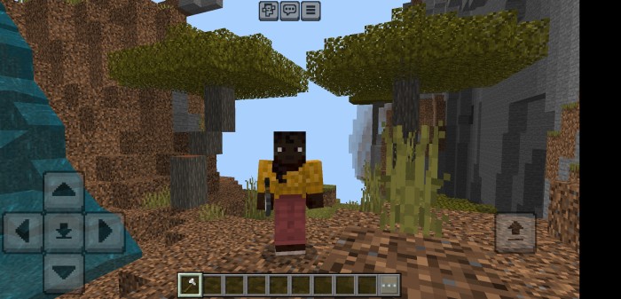Character near trees and cliffs.