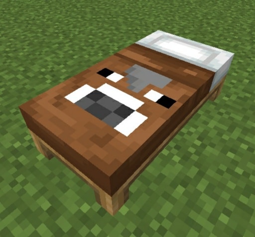 Bed with a cow face design.