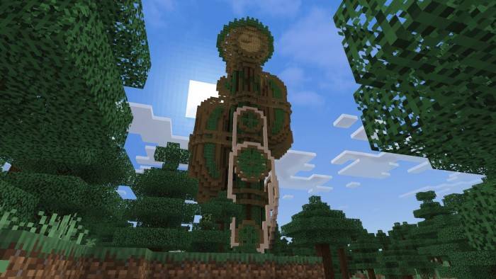 Intricate tower structure in forest.