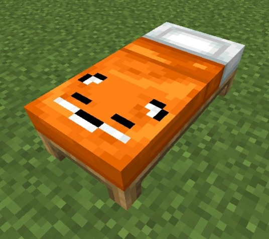 Orange bed with a smiling face design.