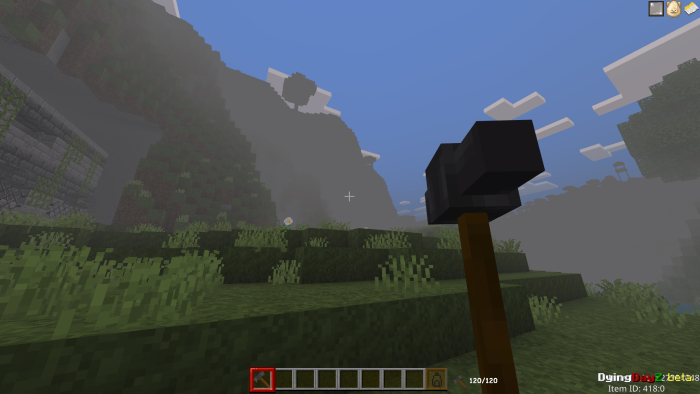 In-game scene with hammer tool displayed.