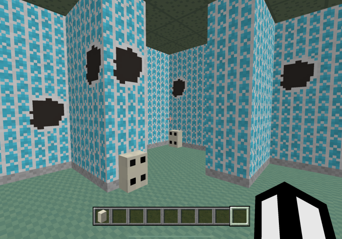 Blue patterned walls with black circles.