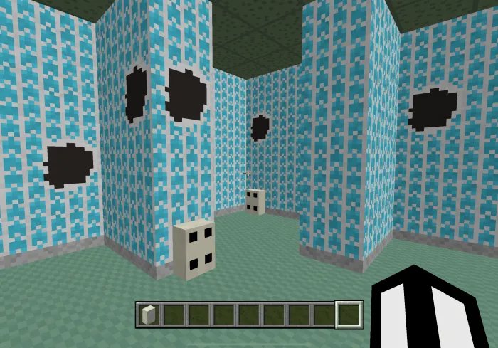 Blue patterned walls with black circles.