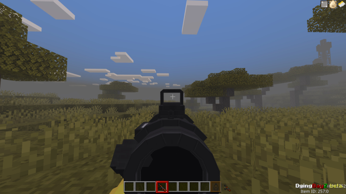 First-person view aiming in a grassy field.
