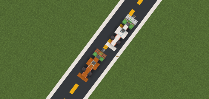 Two F1 cars on a racetrack.