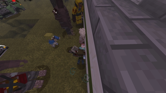 Pixelated characters near a building wall.