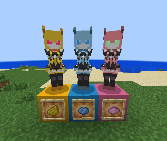 Three colorful robot figures on blocks.
