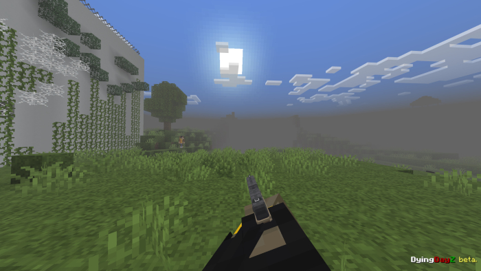 Gun aiming in a grassy landscape.