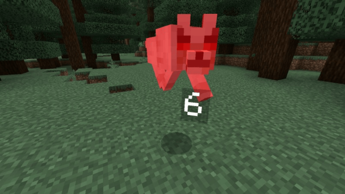 Red creature showing damage number six.