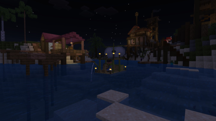 Night scene with boat at village dock.