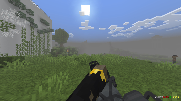 Gun view in a grassy, foggy landscape.