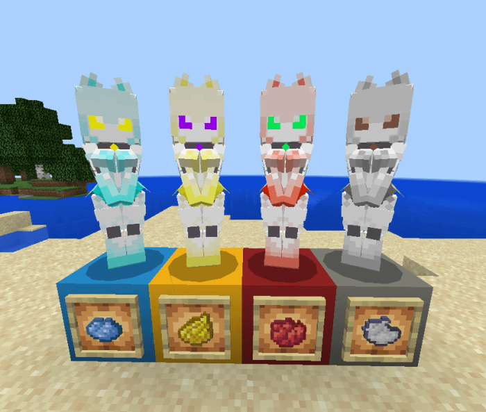 Four colorful robot statues on blocks.
