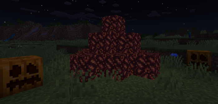 Dark block pile with jack-o-lanterns.