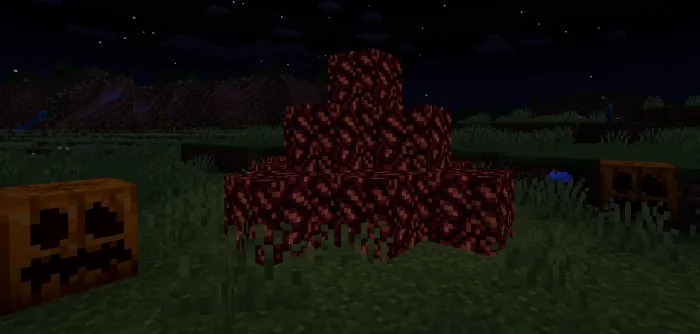 Dark block pile with jack-o-lanterns.