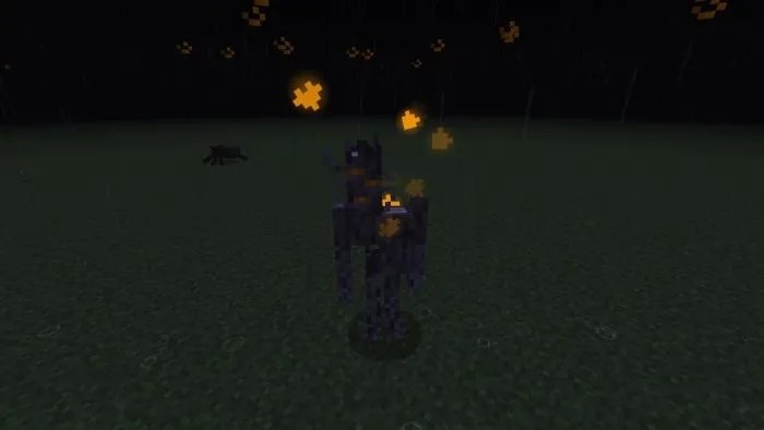 Skeleton with glowing orange particles.