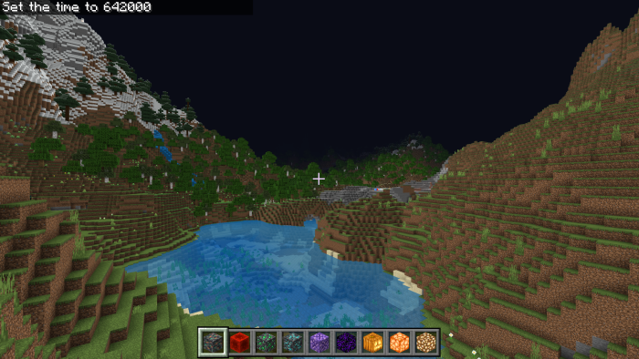 Night vision view of a Minecraft landscape.