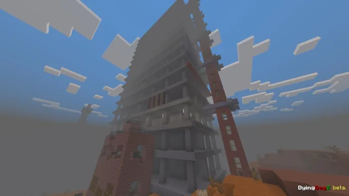 Tall, unfinished building in fog.