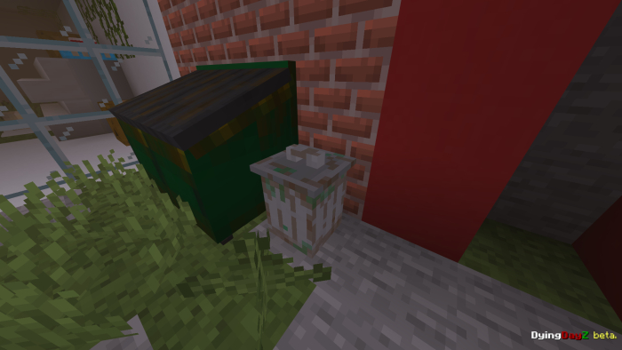 Trash can and bin beside brick wall.