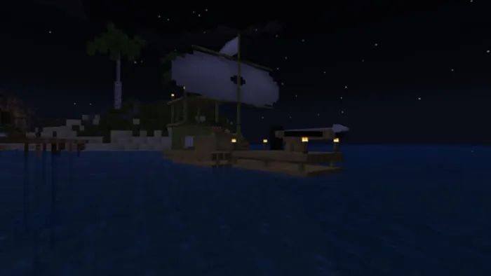 Sailboat on water at night.