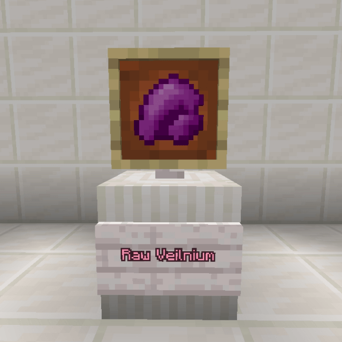 Raw Veilnium ore displayed in a frame.