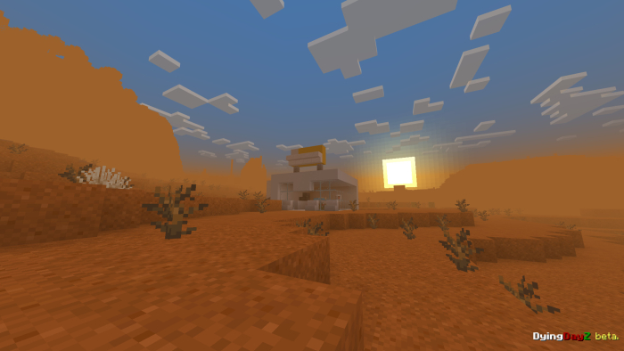 Blocky desert landscape with setting sun.
