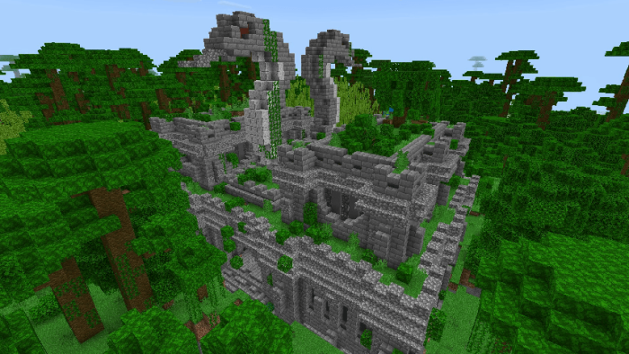 Ancient stone ruin in dense jungle.