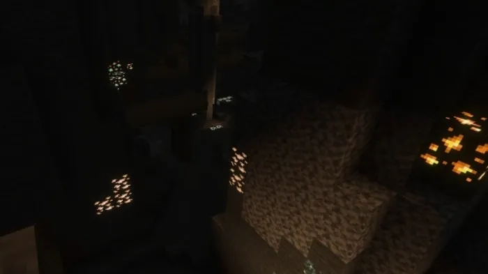 Dark cave with glowing mineral textures.