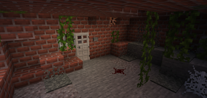 Brick room with vines and a white door.