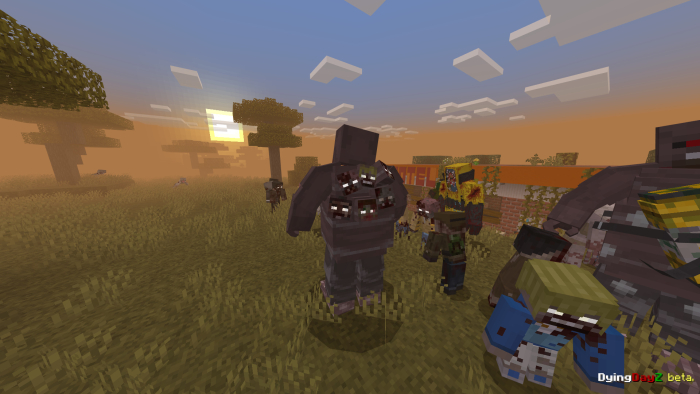 Zombies roam grassy landscape at sunset.