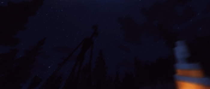 Dark night with a tall, eerie figure.
