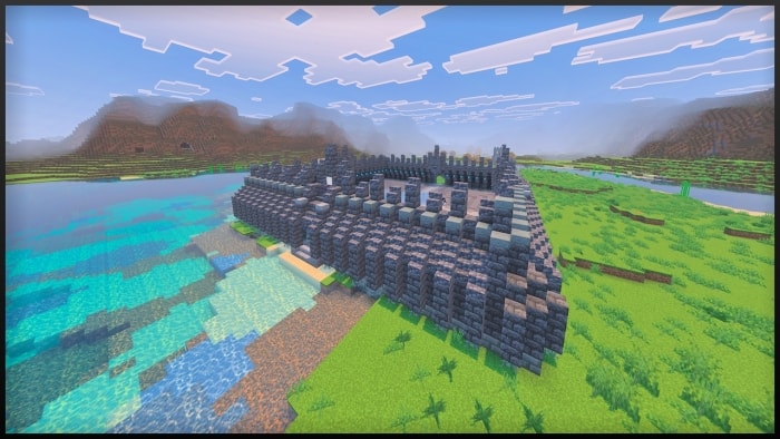 Stone fortress by a lake.