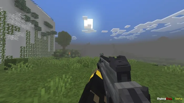 Gun aimed at landscape with sun and mist.