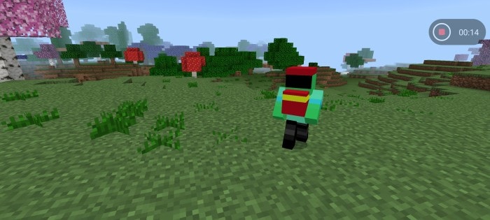 Character running in grassy game world.
