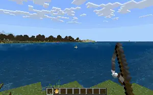Player fishing for useful items by a lake