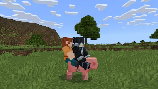 Two players riding a pig together in-game